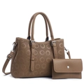 Detail view of large tan tote bag and matching wallet with embossed circle pattern - Khaki