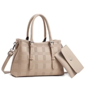 Close-up of beige lychee grain tote and clutch set with embossed checker patterns - Off White