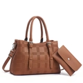 Close-up of brown pebbled leather tote set with 4G geometric pattern and silver hardware - Earthy Yellow