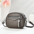 Brown lychee-texture leather crossbody bag with multiple silver zippers and a long tassel - Gray