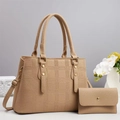 Detail von beigem 2-teiligem Shopper-Set mit geprägter Textur und passender Geldbörse - Aprikose