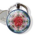 Detailed macro shot of a round mandala glass pendant keychain with red rose design - Rose Mandala With Text Design (JY003983-5)