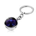 Detail of Libra zodiac keychain featuring a glowing double-sided glass ball on silver metal - Libra (JY004114-7)