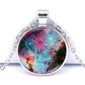 Close-up of a silver glass dome pendant with a colorful galaxy nebula outer space design - Blue Galaxy Style (JY004147-2)
