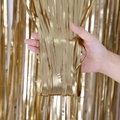 Detail of matte gold fringe curtain showing dense metallic strands and soft texture - Standard Type / Matte Champagne Gold