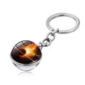 Macro view of solar system keychain showing the planetary nebula glass ball and silver chain - Planet Saturn and Nebula Style (JY004145-11)