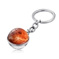 Vue détaillée du porte-clés boule de verre galaxie avec motifs rouges de Mars - Vénus (JY004719-5 Vénus)