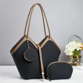 Set di tre borse tote nere a pieghe con manici in pelle marrone e finiture metalliche oro - Nero