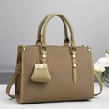 Close-up of olive green woven bucket bag with smooth leather strap and gold buckle - Olive Green