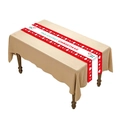 Festive Christmas table runner with The Cutest Christmas text on a beige tablecloth - Merry Christmas Red White