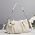 Beige woven pleated shoulder bag with silver chain and metal ball charms in a studio setting - Off White