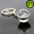 Detailed close-up of a luminous moon glass ball keychain with glowing effect view - Moon