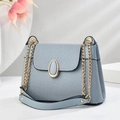 Minimalist light blue macaron handbag with woven texture and gold chain straps - Blue