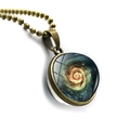 Detailed view of bronze space galaxy nebula pendant with double-sided glass orb design - Golden Green Galaxy Style(JY005534-5)