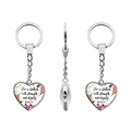 Multiple views of silver heart keychain with Proverbs 31:25 verse and floral pattern - She is clothed with strength and dignity (JY005580-10)