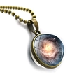 Macro side view of a vintage bronze cosmic nebula glass ball pendant necklace - Blue Universe Style(JY005534-7)
