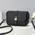 Fashionable black crossbody bag with white contrast stitching and gold twist lock - Black