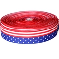 Detail of 4th of July ribbon roll featuring American flag stars and stripes patterns - 200 Yards USA Flag Ribbon