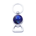 Detailed close-up of a metal bottle opener keychain with Leo zodiac art glass dome - Xswx0236-today