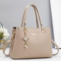 Minimalist beige pebble leather handbag with gold chain and pearl charm detail - Light Khaki