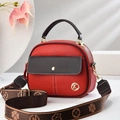 Bolso bandolera redondo bicolor rojo y marrón oscuro con correa ancha estampada - Longitud 21 Ancho 9 Altura 18 / Granate