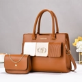 Detail view of stylish color-block tote bag and matching mini chain bag with gold buckle - Earthy Yellow