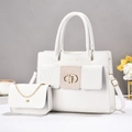 Detail view of white leather tote and small chain bag set with gold hardware and text - White