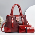 Three-piece red lizard pattern handbag set with glossy finish and gold metal hardware - Red