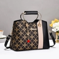 Chic color-block monogram handbag with golden metal handle and luxury heart charm accessory - 26x14x20cm / Coffee