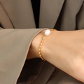 Bracciale barocco francese in titanio dorato con perla d'acqua dolce al polso - Oro (15+5cm)