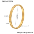 Detail view of 18k gold plated stainless steel bangle with zircon inlaid hearts - Gold Heart Zircon Style (Z132)