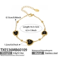 Détail du bracelet en acier inoxydable doré 18 carats avec trois cœurs en verre noir - Bracelet Cœur (TXE536) / 16.5+5cm / Noir