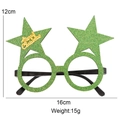 Grüne Glitzer-Weihnachtsbrille in Sternform mit goldenem Merry Christmas Schriftzug - Grüne Sternenbrille