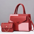 Close-up of a two-piece red handbag set with striped fabric patchwork and gold hardware - Wine Red