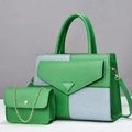 Detail of green leather and denim patchwork handbag set with golden chain strap - Green