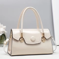 Beige patent leather crossbody bag with shell hardware and wavy flap design - Off White