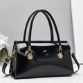 Chic black patent leather crossbody bag with elegant gold shell hardware and wavy flap design - Black