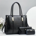 Schickes 3-teiliges schwarzes Leder-Handtaschen-Set mit Shopper, Geldbörse und Clutch - L30 B12 H24 / Schwarz
