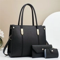 Three-piece black leather handbag set including tote and clutch with gold hardware - Black