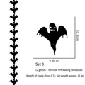 Detailansicht Halloween Geister-Banner-Set mit 12 schwarzen Silhouetten und 5m Schnur - Geist-Stil (12er Set)