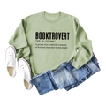 Flat lay of sage green sweatshirt with Booktrovert print, jeans and white sneakers - S / Olive Green Sweatshirt (Black Font)