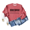 Flat lay of a brick red Booktrovert sweatshirt with white shoes and blue denim jeans - S / Red Sweatshirt (Black Font)