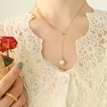 Rose gold Y-necklace featuring wheat leaf details and a round pearl pendant charm - Pull Clasp Two Pearl / Rose Gold