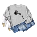 Flat lay of gray long sleeve sweatshirt with turtle print next to white canvas shoes - Grey (Black Font)