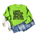 Flat lay of neon green sweatshirt with black text slogan and blue jeans outfit - S / Fluorescent Green