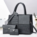 Detailed view of 3-piece black tote bag set featuring faux crocodile texture and gold hardware - Gray