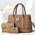 Close-up of textured earth-tone tote set showing gold logo and premium pebbled faux leather - Three-Piece Set / Brown