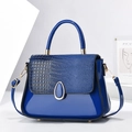 Glossy navy leather handbag with crocodile pattern flap and golden metal hardware - Blue