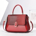 Red patent leather handbag with crocodile pattern flap and golden hardware accents - Wine Red