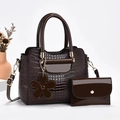 Detail of dark brown crocodile embossed glossy leather tote bag with matching wallet set - Coffee